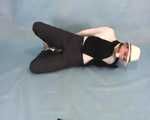 Dressed up Rozanka in a fantastic bondage session (video)