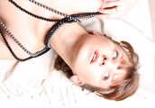 Barefoot topless Polina poses with and without handcuffs and legcuffs