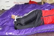 Samantha tied and gagged on bed wearing shiny nylon rainwear (Pics)