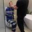 Myxxxy surprised by an Intruder in her Bathroom finally bound and gagged in Rainwear