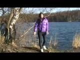 Alina walking in a lake wearing a supersexy purple down jacket and a jeans (Video)