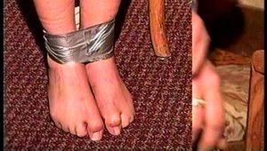 FIRST GRADE LATINA SCHOOL TEACHER  IS F0RCED TO STUFF HER OWN MOUTH WITH HER SOCKS, TAPE UP HER MOUTH, LEGS AND BARE FEET (D66-7)