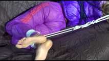 ***HOT SANDRA*** tied, gagged and hooded with ropes and a cloth gag on bed wearing a sexy purple shiny nylon down jacket and a rain pant (Video)