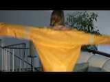 Get 2 Videos with Katharina in her shiny nylon Rainwear from our Archives
