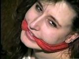 24 YEAR OLD ERICA IS MOUTH STUFFED, CLEAVE GAGGED, ROPE GAGGED & BALL-TIED WITH BLACK ELECTRICAL TAPE ON THE FLOOR (D51-16)