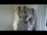Get 2 Videos with Alina enjoying her Shiny Nylon Rainwear together with a Friend from our 2010 Archive