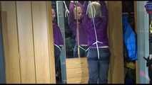 Pia tied with ropes overhead and gagged with a ballgag wearing sexy rain pants and a rain jacket (Video)