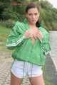 Watching ***OUR SEXY ARCHIVE MODEL JENNY*** wearing a sexy white shiny nylon shorts and a green shiny nylon rain jacket posing for you (Pics)