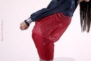 Shelly bound and gagged in shiny nylon rainwear