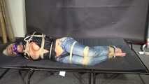 Alice bound, gagged and vibed in a shiny nylon Windbreaker. She enjoyed it :)