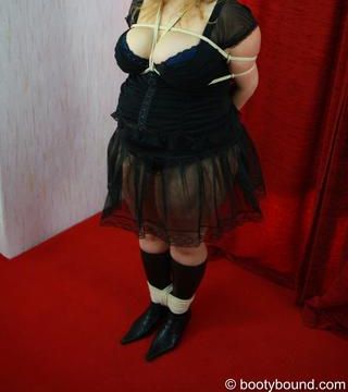 claudia are tied up with rope in PICS