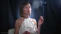 34 years old lady is smoking cork 100mm cigarette
