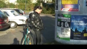 Enni riding the bicycle wearing a sexy shiny nylon shorts beneath the jeans and a downjacket on naked skin (Video)