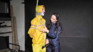 Aiyana and Myxxxy having fun together in shiny nylon Rainwear