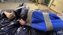 Lana tied and gagged in shiny nylon Rainwear desperately trying to free herself