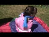 03:50 Min. video with Julia tied and gagged in a shiny pink skisuit