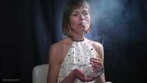 34 years old lady is smoking cork 100mm cigarette