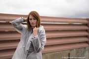 Miss Petra in transparent Hunter rain jacket and patent leggings