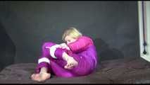 PIA tied and gagged with ropes and cloth gag on a sofa wearing an sexy oldschool purple/pink skisuit (Video)