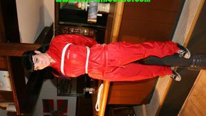 Get 548 Pictures with Jill tied and gagged in shiny nylon rainwear from 2005-2008!