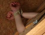 Tapegagged barefoot Doris in red underwear tied to the wooden stand with her feet tied above her head