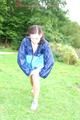 Enni wearing sexy blue shiny nylon shorts and rainjacket during her warm-up (Pics)