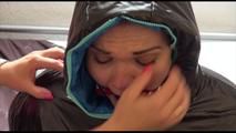 Jill tied, gagged and hooded on bed wearing a shiny black downjacket and shiny blue rain pants (Video)