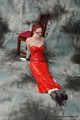 Bound in red PVC dress