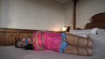 Check out Rachel Adams bound and gagged in shiny nylon shorts and Windbreaker