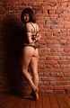 Barefoot Gwen in bra and panties, hogtied on the floor