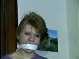 22 Yr OLD LISA IS RUBBER BAND BALL-GAGGED, MOUTH STUFFED, HANDGAGGED, OTM & CLEAVE GAGGED (D43-6)