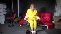 Sexy Pia being tied and gagged on a chair wearing sexy shiny nylon rainwear (Video)