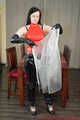 Selfbondage in PVC und Regenmantel
