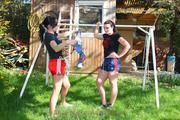 Jill tied and gagged by her friend in shiny nylon shorts