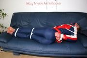 Katharina tied and gagged in a skisuit