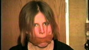 19 YEAR OLD SPUNKY BRAT AJ IS CLEAVE GAGGED & TIED TO A CHAIR (D37-13)
