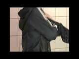 Get 2 Videos of a nice woman from our 2008 Archive enjoying her shiny nylon Rainwear at home