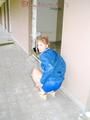 Leonie wearing a sexy shiny nylon shorts and a rain jacket posing for the camera (Pics)