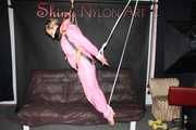 Sexy SANDRA wearing a hot pink oldschool downbib and a down jacket being tied and gagged with ropes and a clothgag hanging on the ceiling  Part 2 of 2 (Pics)