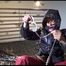 Sonja ties and gagges herself on a bed wearing a supersexy crazy sensation downwear (Video)