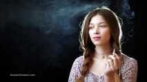 Really sexy babe Irina showing her smoking skills with a 120mm Cigaronne