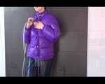 Get an Archive Video with Mara enjoying a shower with her shiny nylon downjacket