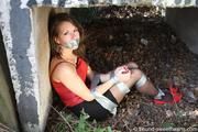 Susanne tied up with tape PICS