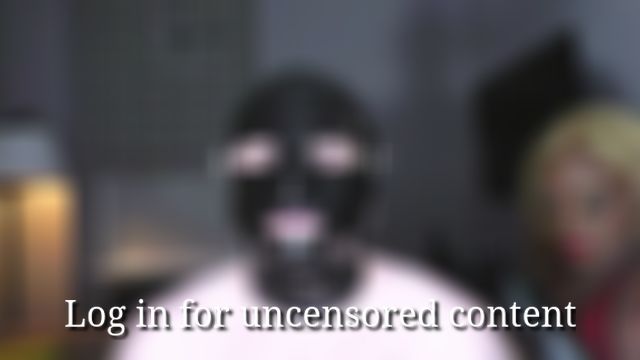 Huge rubber hands in the gimp’s mouth