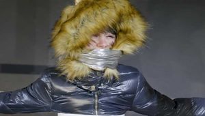 Lana tied and gagged in a shiny nylon Downjacket