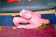 Katharina tied and gagged in shiny nylon ski suit
