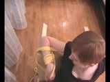 Alice Lee - Dress-wearing beauty gets tied to a table and escapes (video)