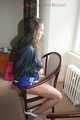 Stella being tied and gagged with ropes and a clothgag on a chair wearing a sexy shiny nylon short and a rain jacket (Pics)