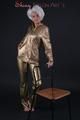 Blonde archive girl posing in a studio wearing a sexy golden rainwear combination (Pics)