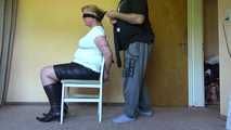 Cuffed on a chair 002